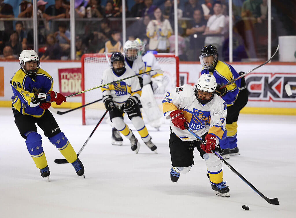 Players participating in a hockey tournament